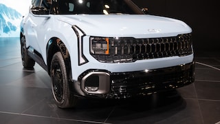 The Kia EV3 in white, viewed from the front.