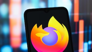 Smartphone with Mozilla Firefox logo.