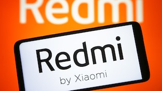 Smartphone with Xiaomi Redmi logo.