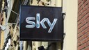 The Sky logo on a sign on a building