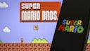 Smartphone with Super Mario logo in the foreground. In the background, the Super Mario Bros. logo.