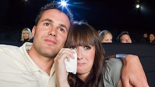 Young Couple at the Movies Watches Sad Film and Cries