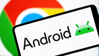 Smartphone with Android logo, with the Google logo in the background.