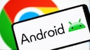 Smartphone with Android logo, with the Google logo in the background.
