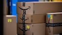 Several Amazon packages stacked