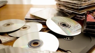 Several CDs in a pile