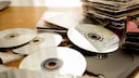 Several CDs in a pile