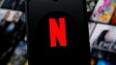 Netflix logo on a smartphone