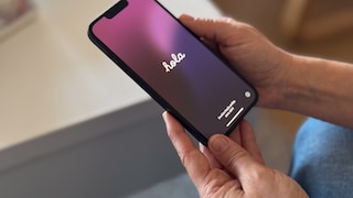 Holding the iPhone 16e