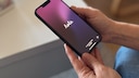 Holding the iPhone 16e