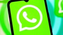 WhatsApp logo on a smartphone