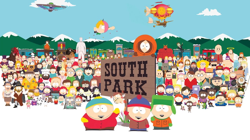A scene from the animated series "South Park." In the foreground, three main characters stand in front of a large sign reading "South Park." In the background, numerous other characters from the series, along with the snow-covered mountains and buildings of the fictional small town, are visible.