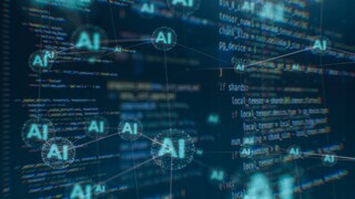 The image shows several small AI cells, all interconnected. Additionally, several AI codes can be seen, though somewhat blurred.