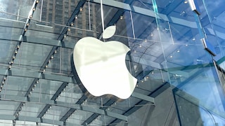 Apple logo on a glass building facade