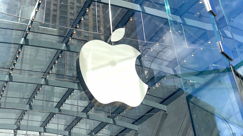 Apple logo on a glass building facade