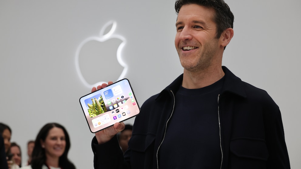 Apple CEO John Ternus with the iPhone Duo