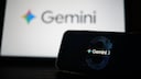 Two screens: The smaller front one displays Version 3 of Google Gemini, while the larger one in the back shows the Google Gemini logo.