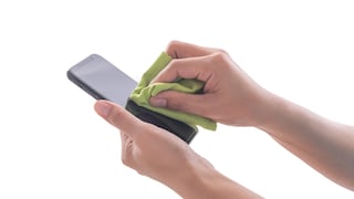 Woman Wipes Smartphone With Cloth