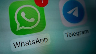 WhatsApp and Telegram logos. WhatsApp has a notification.