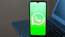 WhatsApp logo on a smartphone