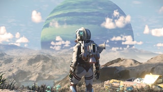 A figure in a bright spacesuit with a helmet and large backpack stands in a rocky landscape. In the background, a large green-blue planet rises against the light blue sky. To the right of the figure, a small futuristic vehicle is positioned among plants and rocks.