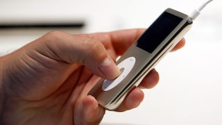 Man Holds iPod Classic