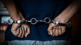 Woman in Handcuffs