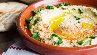 Delicious with pita, vegetables, and meat: hummus