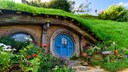 In the film adaptations of Tolkien's books, Hobbits live in such caves. In Matamata, the set is now a tourist attraction.
