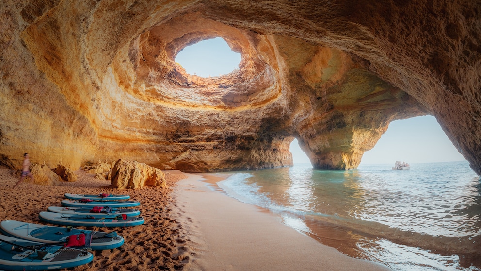 Inside the bell-shaped Benagil cave, it is pleasantly cool and surprisingly bright.