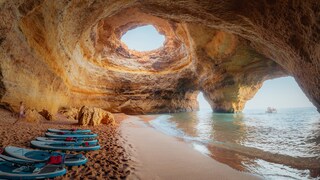 Inside the bell-shaped Benagil cave, it is pleasantly cool and surprisingly bright.