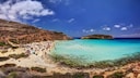Rabbit Beach is located on the Italian island of Lampedusa, off the coast of Sicily.