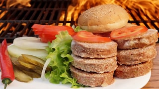 Before the slice of meat is placed on the grill, it is thoroughly soaked in butter.