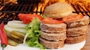 Before the slice of meat is placed on the grill, it is thoroughly soaked in butter.