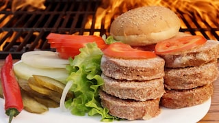 Before the slice of meat is placed on the grill, it is thoroughly soaked in butter.