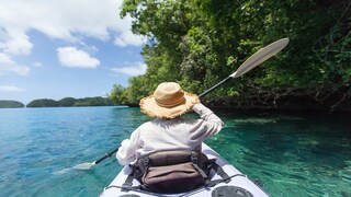 A longtail boat takes you to the uninhabited Bamboo Island in Thailand