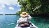 A longtail boat takes you to the uninhabited Bamboo Island in Thailand