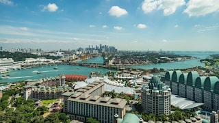 The new Singapore Oceanarium opens on July 23 on Sentosa Island and is three times the size of its predecessor. In the photo, it is the building with the red roof by the water.