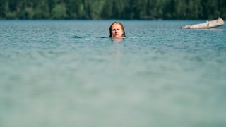 Urinating in a Swimming Lake