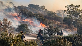 Firefighters Battling a Wildfire on Crete