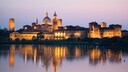Mantua's old town is reflected in Lake Lago di Mezzo.