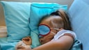 Little Girl Sleeps on Plane