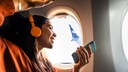 Woman on One of the World's Happiest Flight Routes