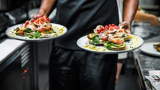 Man with Two Plates in the Restaurant