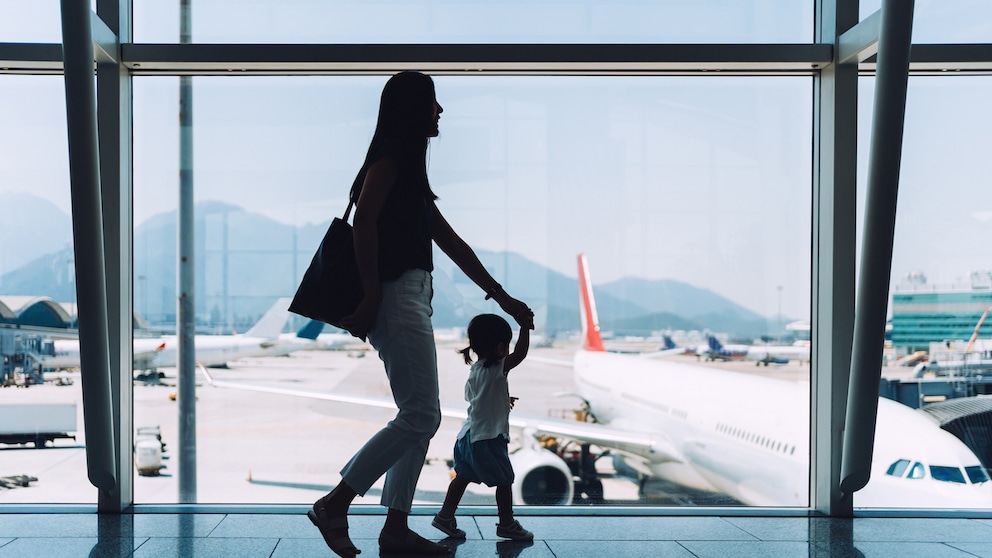 Mother with Child at the Airport