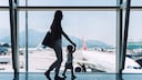 Mother with Child at the Airport