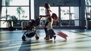 Mother and child embark on a booked trip that became more expensive afterward