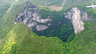 In the world's deepest sinkhole, China's Xiaozhai Tiankeng, a unique ecosystem has developed over tens of thousands of years.