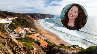 What is it like to live where others vacation? Our author shares her experiences living in Portugal (pictured: the popular Praia da Arrifana in the Algarve).