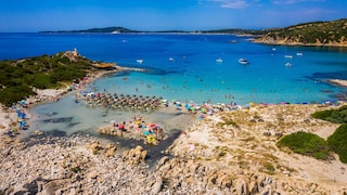 On a beach in Sardinia, certain groups of people are banned from using umbrellas.